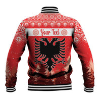 Red Christmas baseball jacket back view with eagle graphic, striped collar and cuffs