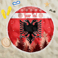 Red round beach blanket with white fringe, black double-headed eagle and trees, “Your Text”