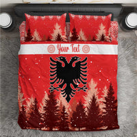 Red Christmas bedding set with two pillows; eagle emblem over pine forest and white stripe.