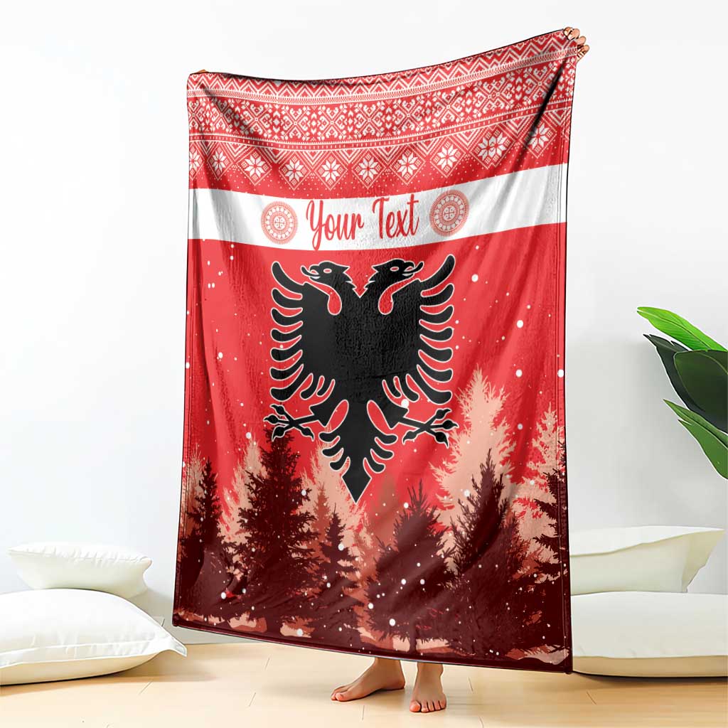 Red Christmas blanket with striped border, personalized text, and double-headed eagle center
