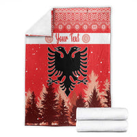 Red double-headed eagle Christmas blanket folded with white border and personalized text band