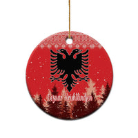 Red ceramic round ornament with double-headed eagle and personalized lettering, hanging loop.