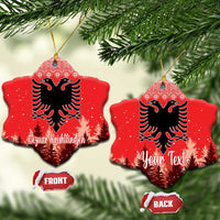 Red ceramic snowflake-shaped ornament with double-headed eagle and personalized lettering, hanging loop.