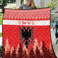 Red and white quilt with personalized text and Albanian double-headed eagle