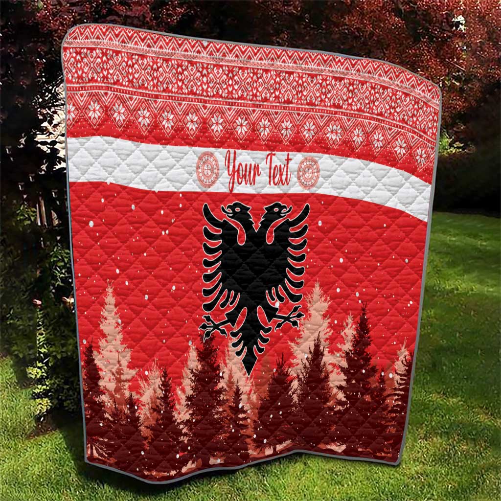 Red quilt with white band, personalized text, and black Albanian double-headed eagle
