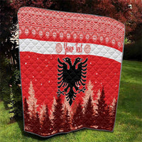Red quilt with white band, personalized text, and black Albanian double-headed eagle