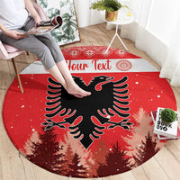 Red round Christmas carpet with black double-headed eagle, trees, and “Your Text”