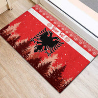 Red rubber doormat with double-headed eagle, pine trees, and “Your Text” on white stripe