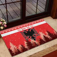 Red personalized rubber doormat featuring double-headed eagle and pine trees with patterned border