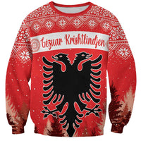Red holiday sweatshirt with double-headed eagle graphic and festive patterned trim