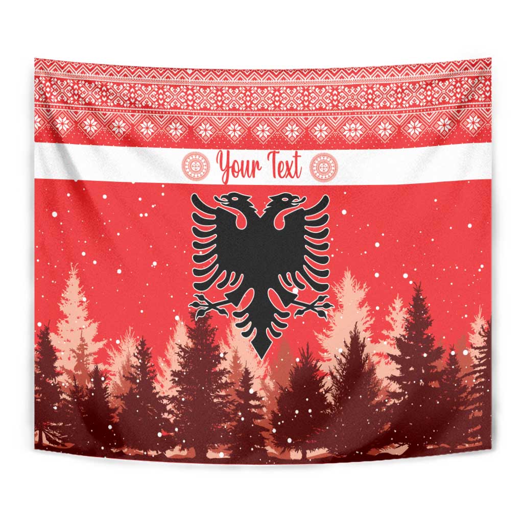 Red Christmas tapestry close-up with double-headed eagle symbol, pine trees, and white stripe trim.