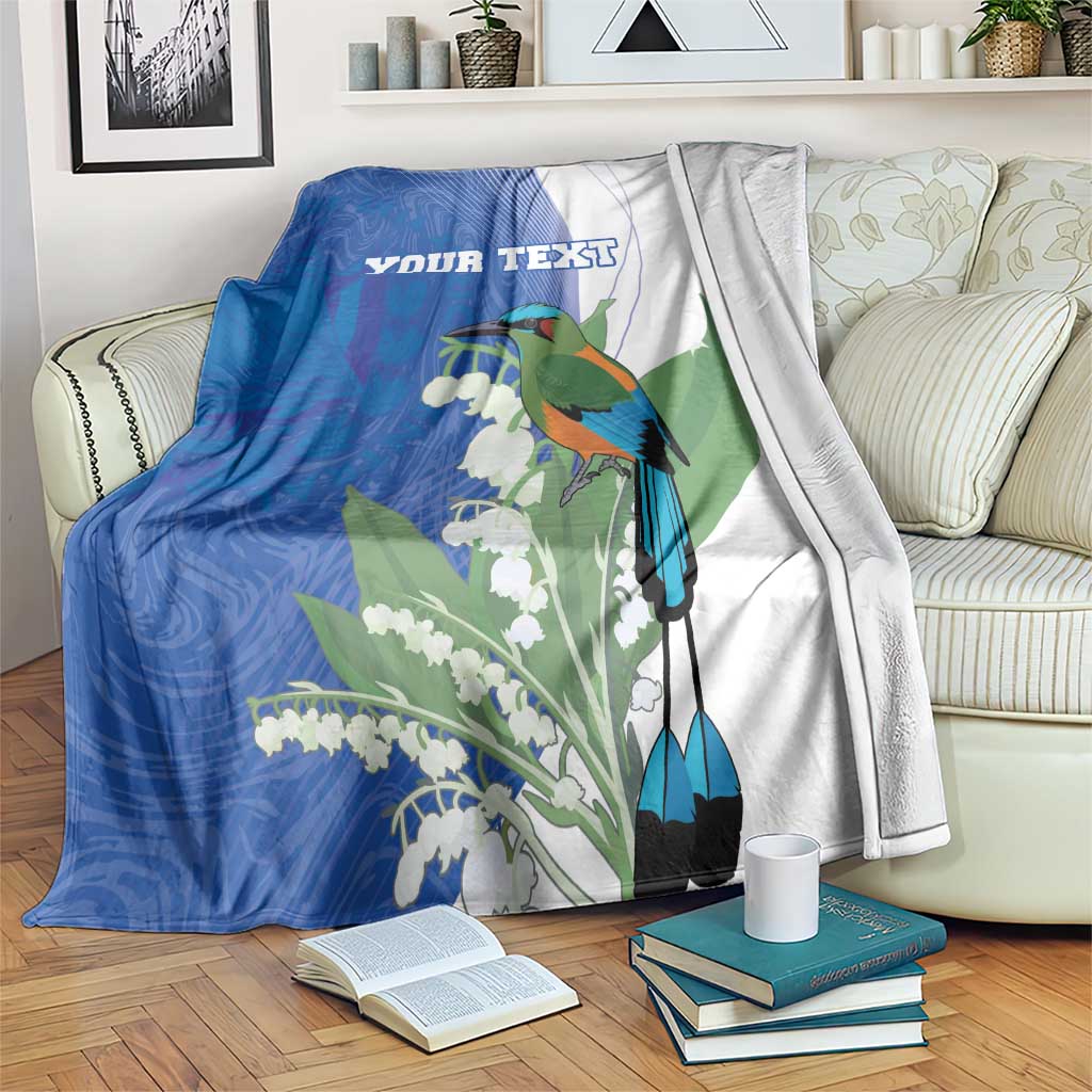 Personalized blue and white blanket with green bird and yucca flower illustration