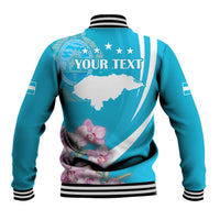 Blue baseball jacket back with map graphic, stars, striped sleeves, ribbed cuffs