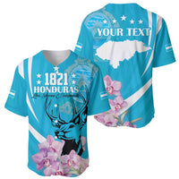 Blue baseball jersey, front and back views with 1821 Honduras, deer and orchid graphics.