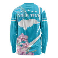 Blue long-sleeve shirt with large back graphic and "YOUR TEXT" banner