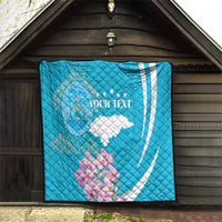 Personalized blue quilt with deer outline, Honduras flag map, and white text indoors