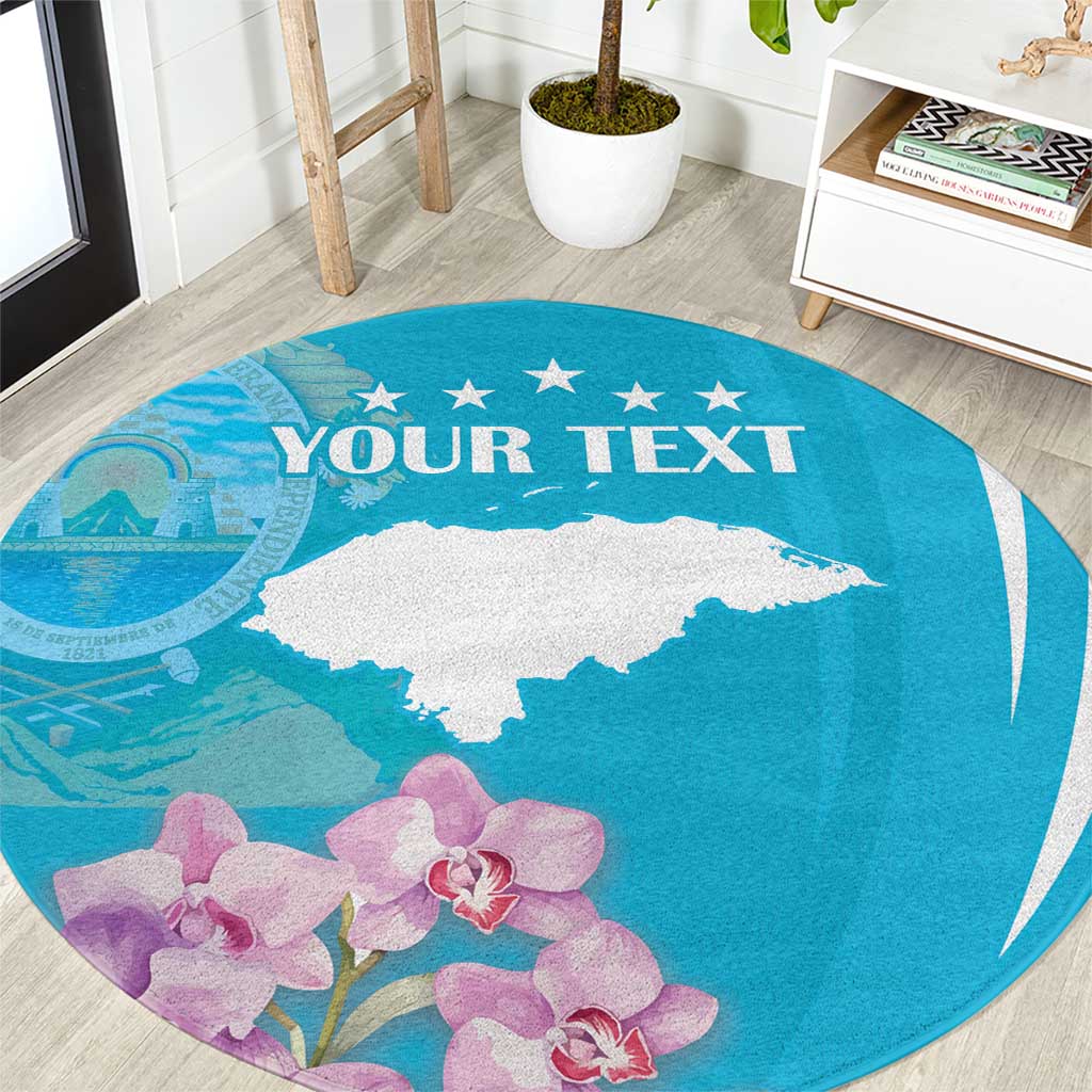 Blue round area rug with white deer silhouette, purple orchids, and 'YOUR TEXT'.