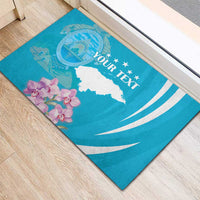 Blue rubber doormat with white map graphic, orchids, and custom text.