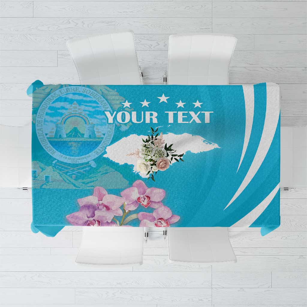 Blue tablecloth featuring custom text, circular seal graphic, purple flowers, and white stripes