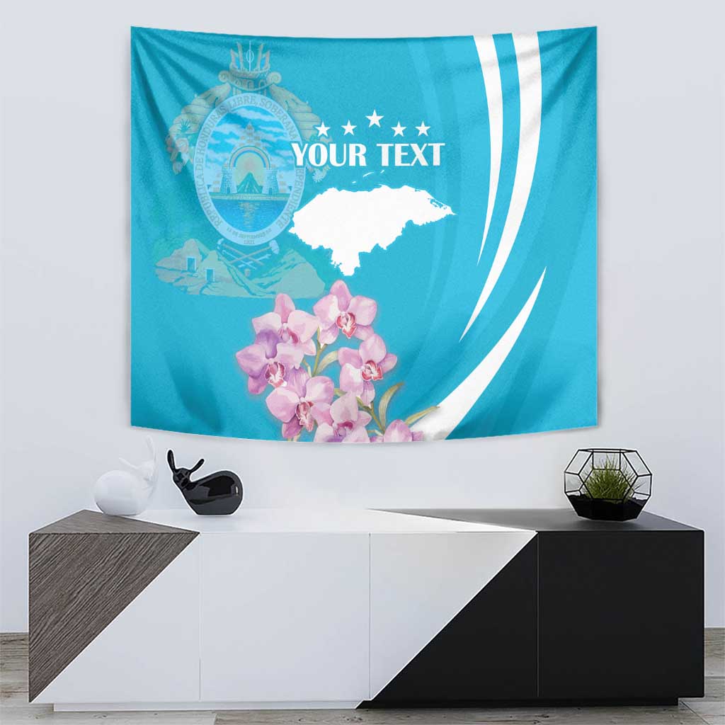 Blue tapestry wall hanging featuring crest, stars, white map shape, and pink orchid blooms.