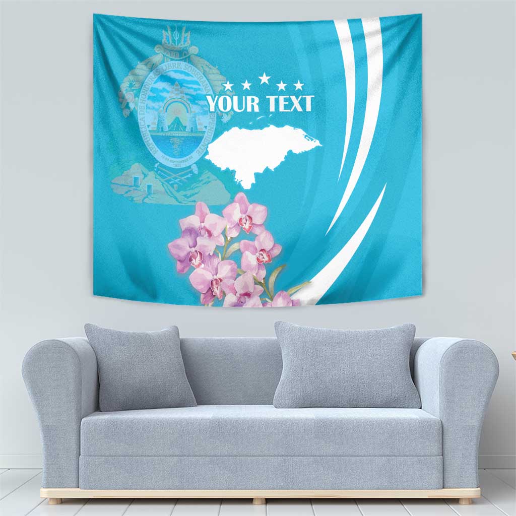 Blue tapestry wall hanging with crest emblem, stars, white map shape, and pink orchids.
