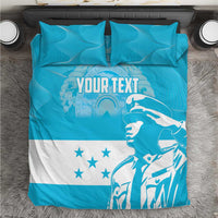 Blue and white personalized bedding set with bold graphic and "YOUR TEXT" print