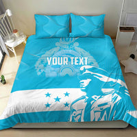 Blue and white comforter bedding set with centered "YOUR TEXT" graphic and pillows