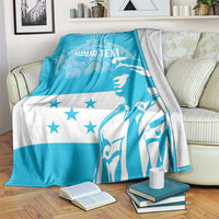 Blue and white blanket with custom text, star pattern, and bold figure print