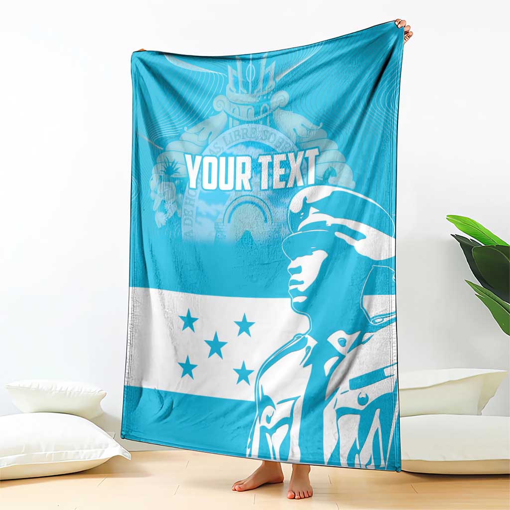 Blue and white personalized blanket with “YOUR TEXT,” stars, and large figure artwork