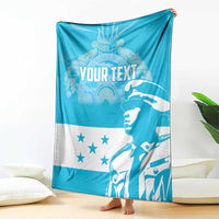 Blue and white personalized blanket with “YOUR TEXT,” stars, and large figure artwork