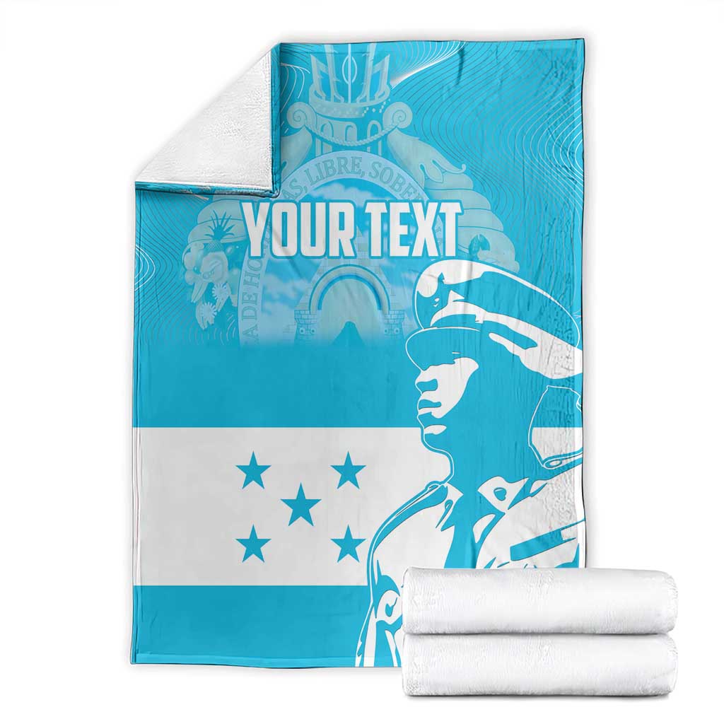Blue and white blanket with custom “YOUR TEXT,” star pattern, and figure graphic