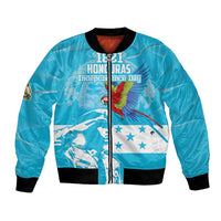 Blue unisex bomber jacket with front zipper, Honduras flag graphic and scarlet macaw