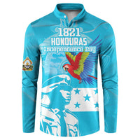 Blue button-front sweatshirt with 1821 Honduras Independence Day text and macaw graphic