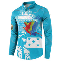 Blue button-front sweatshirt front with 1821 Honduras Independence Day text and macaw
