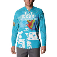Blue button-front sweatshirt on model with 1821 Honduras Independence Day graphic