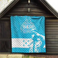 Personalized blue quilt with white Honduras bird graphic and stars, wall-hung display