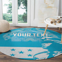 Blue round carpet with white stars and decorative bird graphic, text "YOUR TEXT".