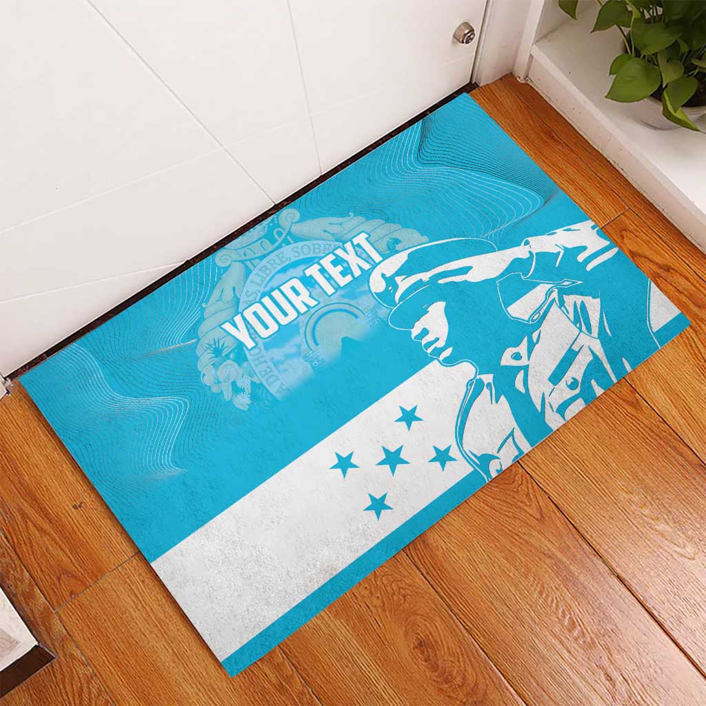 Blue rubber doormat shown on hardwood floor, customizable text, bird graphic and star stripe