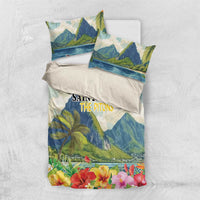 Tropical hibiscus bedding set with blue mountain landscape, palm leaves, and two matching pillowcases