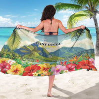 Pitons sarong worn like a wrap, light blue-green with tropical flowers and hibiscus border