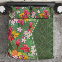 Green tropical floral bedding set with pink, yellow, and red flowers and geometric panel