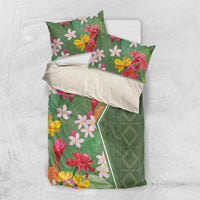 Green tropical floral bedding set with coordinating pillowcases and geometric side panel