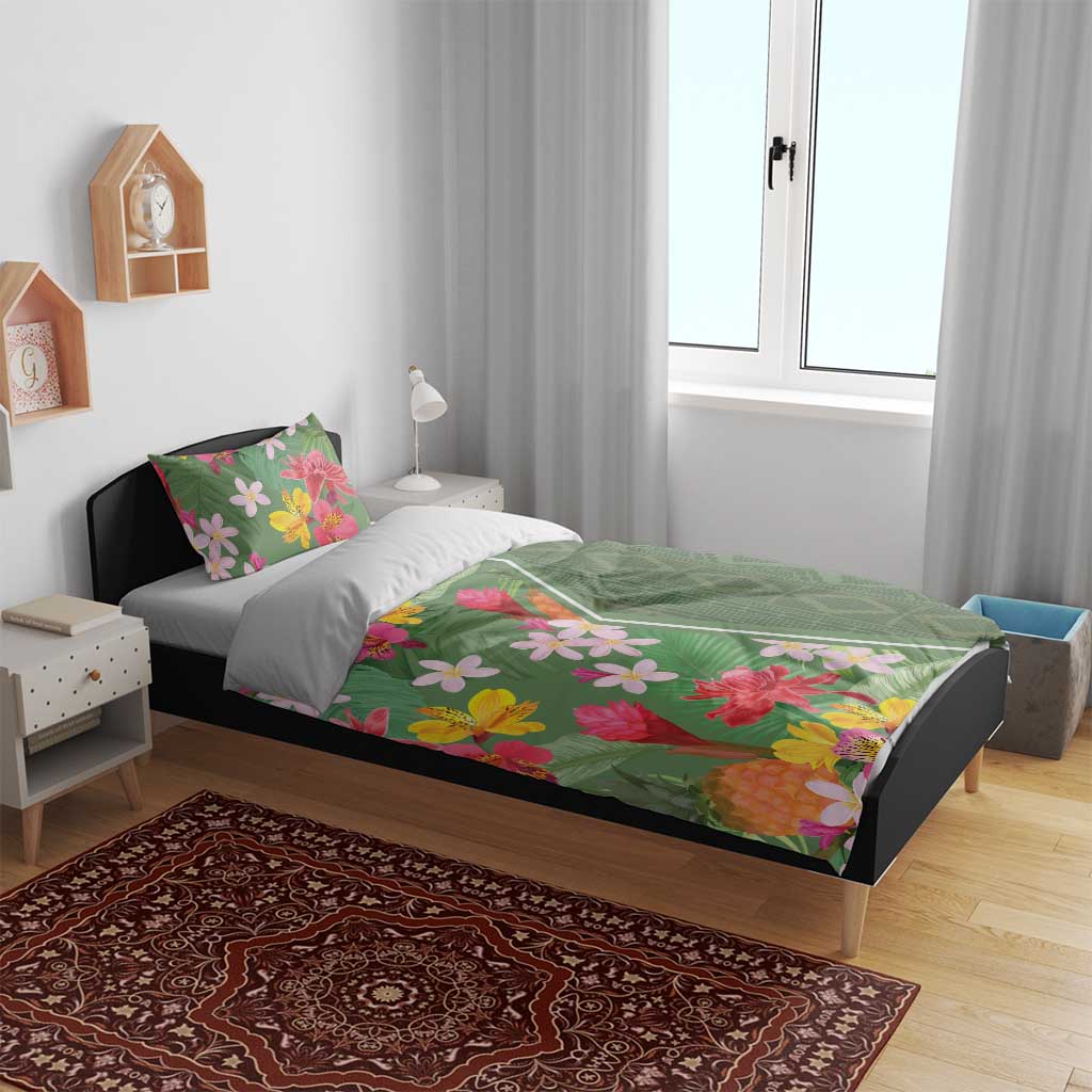 Green tropical flower duvet set with pink, yellow, and red blooms on a bed
