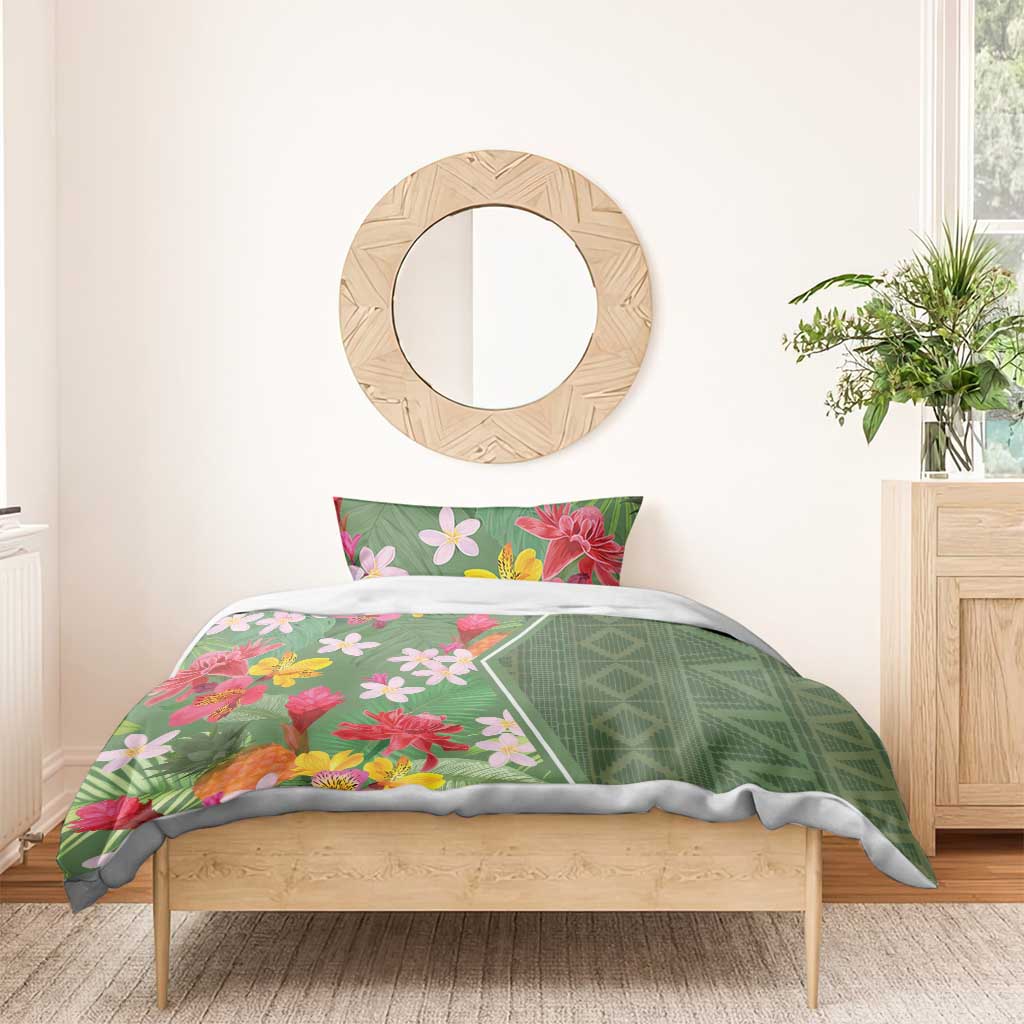 Green tropical floral duvet set with pink and red blossoms and a geometric diamond panel