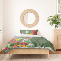 Green tropical floral duvet set with pink and red blossoms and a geometric diamond panel