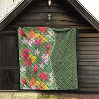 Green tropical floral quilt hanging, quilted diamond texture and bright multicolor flower design