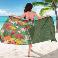 Green tropical floral sarong with large flower panel and geometric vine pattern