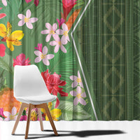 Close view of green tropical flower curtain with multicolor blossoms and leaves