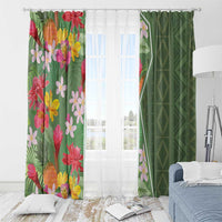 Green tropical flower curtain panel with multicolor blooms and a green geometric panel