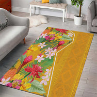 Yellow tropical flowers area rug with green leaves and bright pink, purple, and white blossoms
